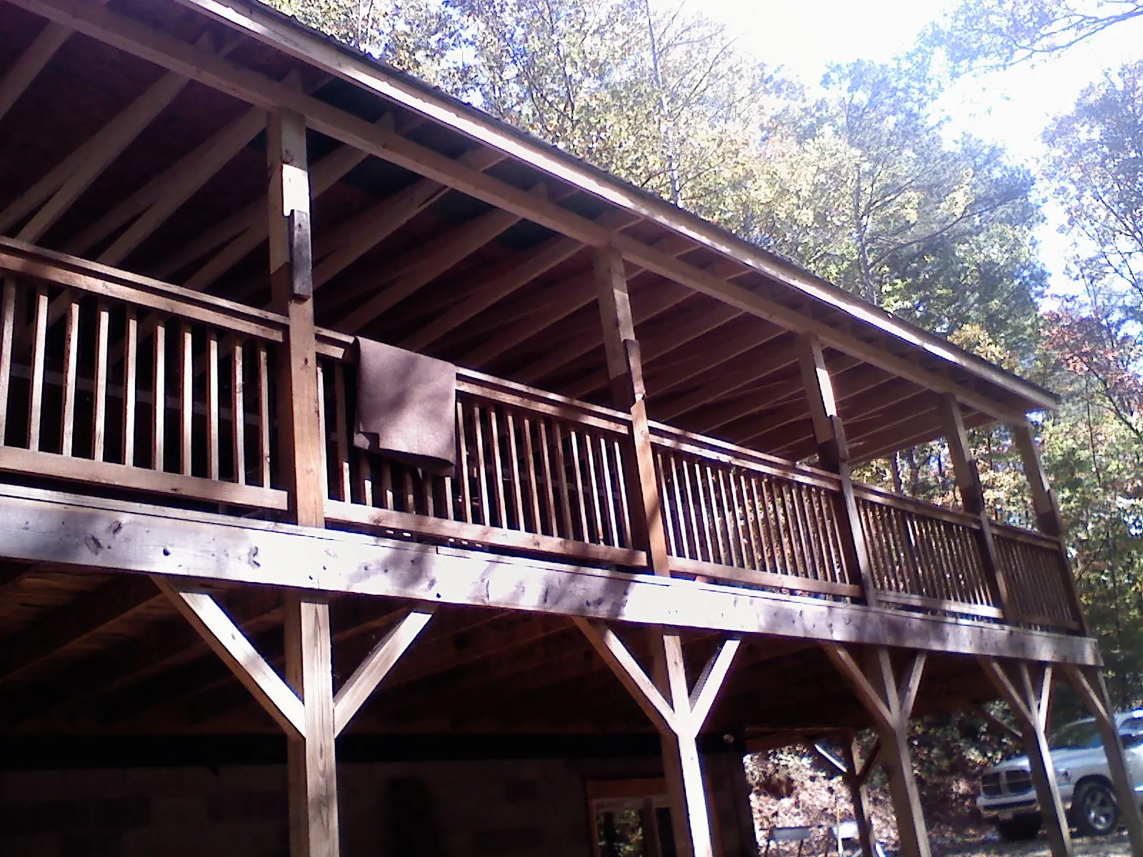Timber framing under a new elevated porch and deck — Roof Leak Repair in Atwater by Roofing Brothers